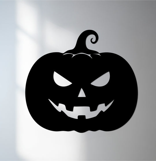 The darkest area of this Jack-O’Gleam Halloween pumpkin metal art for wall creates a striking silhouette with its scary, carved features.