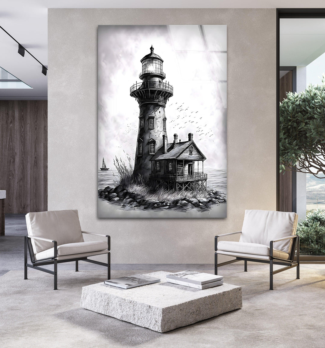 Black and white glass artwork of a tall lighthouse rising above a rocky shoreline.
