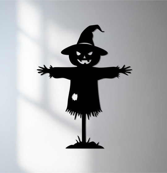Stillness in the air as a spooky scarecrow is captured in this Halloween metal wall decor, a rustic silhouette adding a touch of seasonal fright.