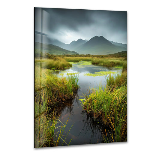 Flowing reeds in the Serene Highland Marsh **glass wall art decor** suggest a gentle breeze over the calm water, creating a peaceful nature escape.