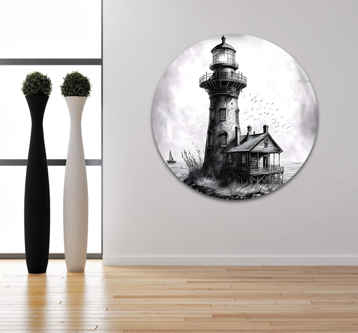 Glass wall art of a rustic lighthouse standing by the water with birds above.