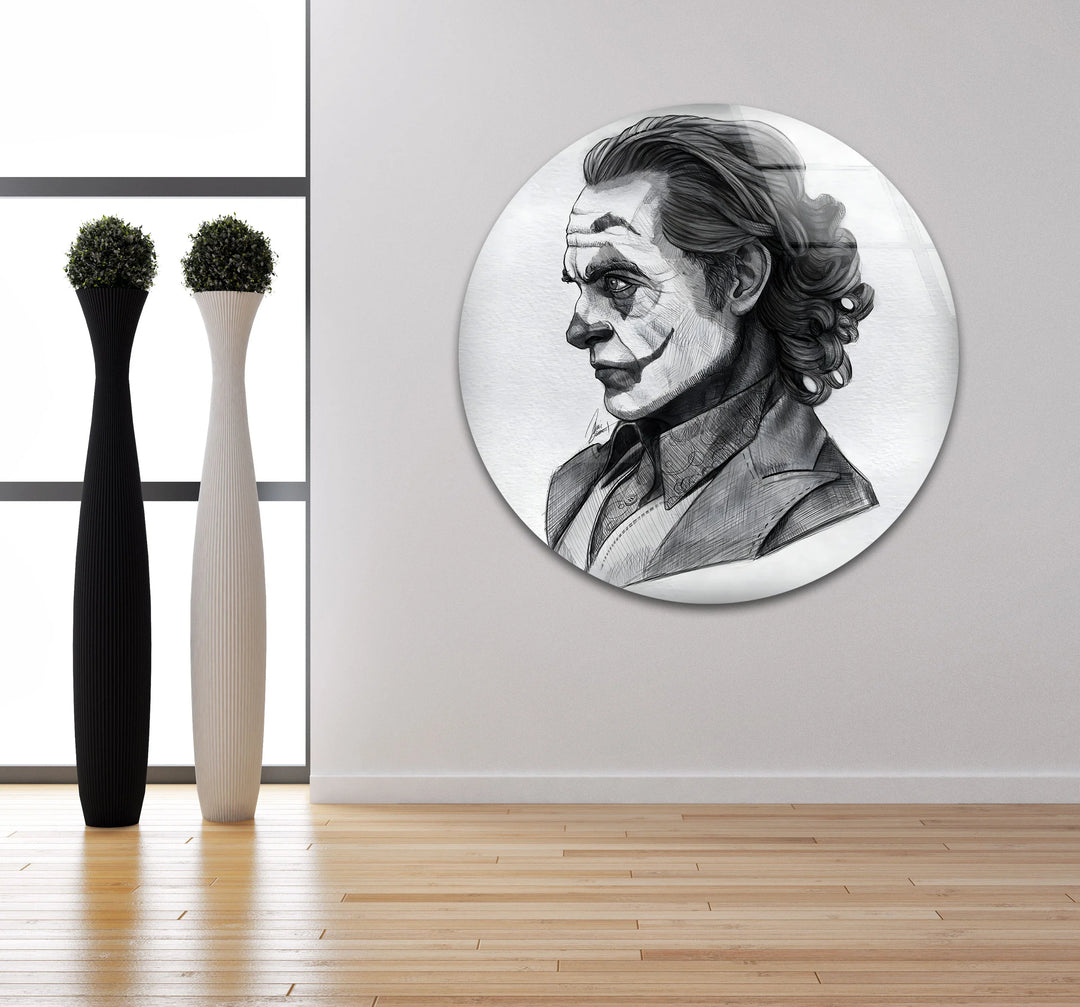 Glass wall art of a stylized male figure with dramatic makeup in hand-drawn shading.