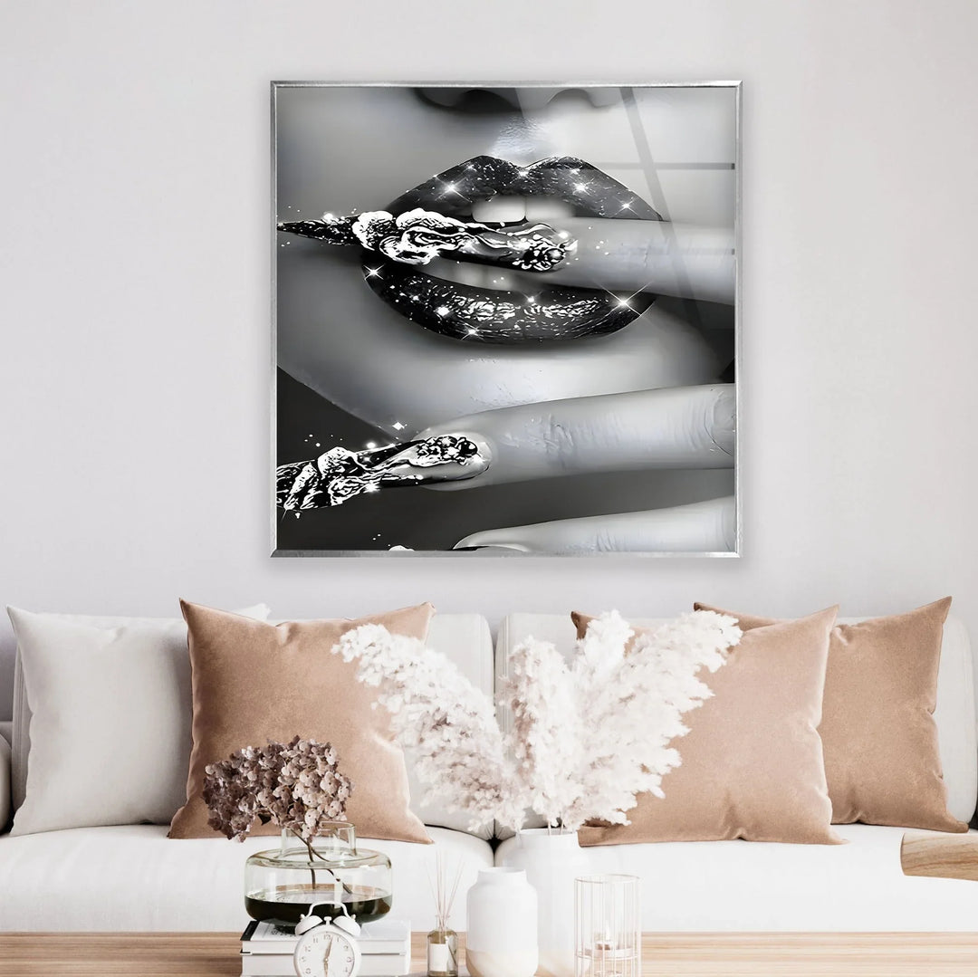 Black and white glam artwork emphasizing glittery lips and bold sculpted nail designs.