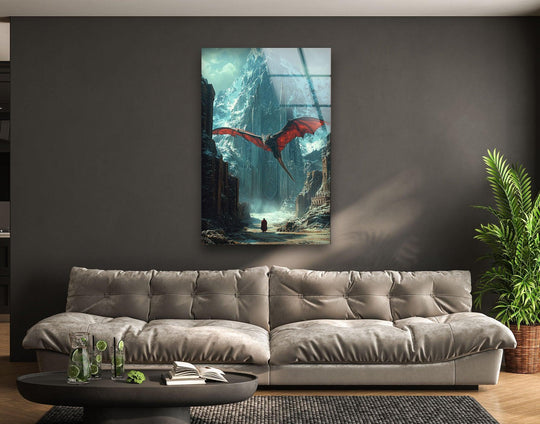 Organic forms frame a striking red dragon and lone figure in this tempered glass wall art, evoking a sense of fantasy against the backdrop of a frozen mountain city.