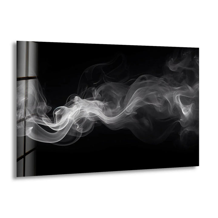 Black and white glass wall art featuring swirling smoke drifting across a dark background.