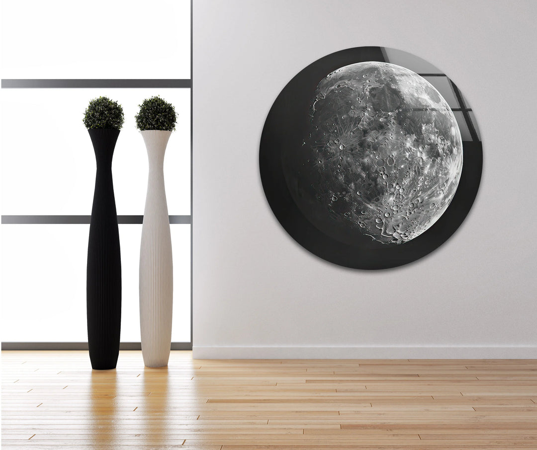 Black and white space-themed artwork on glass featuring a realistic illuminated moon.