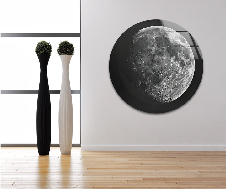 Black and white space-themed artwork on glass featuring a realistic illuminated moon.