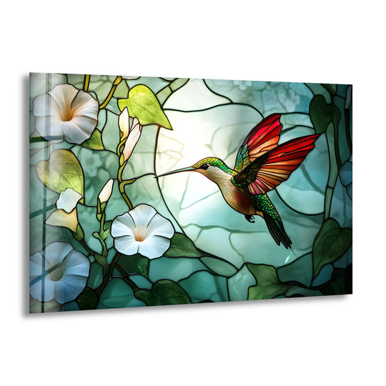A vibrant hummingbird with fiery red wings showcases striking color contrast against the cool teal and soft white of this glass art painting.