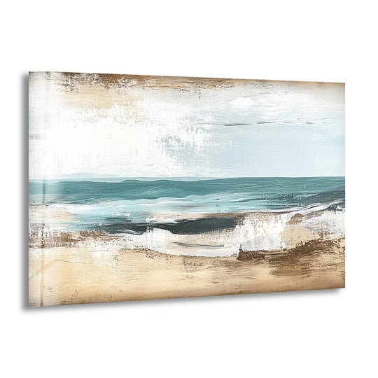 Overlapping shades of white, cream, and light blue create a blended background effect in this tranquil shoreline home decoration glass wall art.