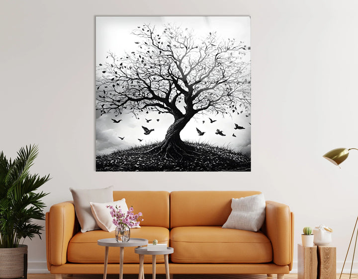 Detailed monochrome nature artwork on glass depicting a leaf-shedding tree in a windy scene.