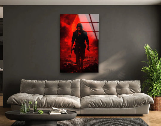 Light and shadow interplay dramatically across the cinematic red shadow gunman glass wall art, highlighting the intense mood achieved through precise glass printing.