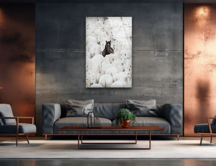 Artistic herd composition on tempered glass featuring one black horse creating dramatic visual contrast.