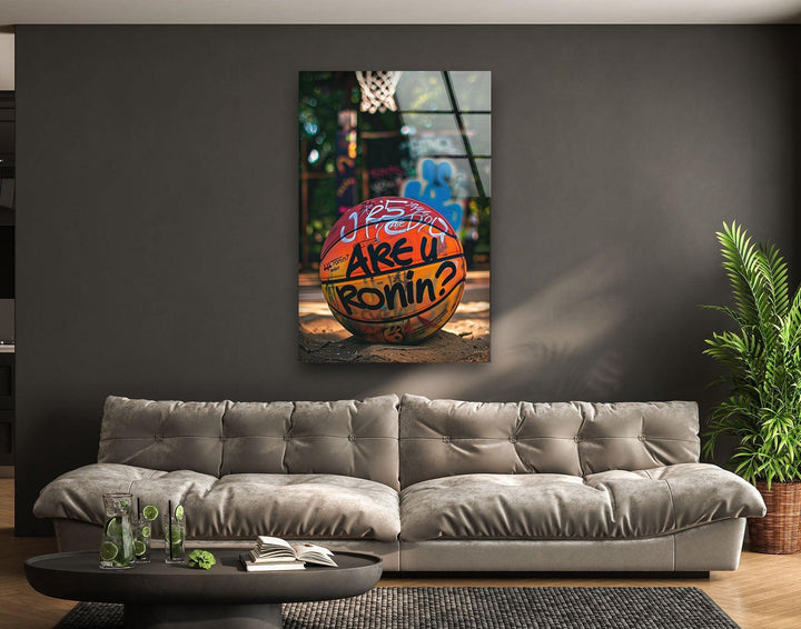 Vibrant street-style basketball artwork on glass featuring a tagged ball in a graffiti court.