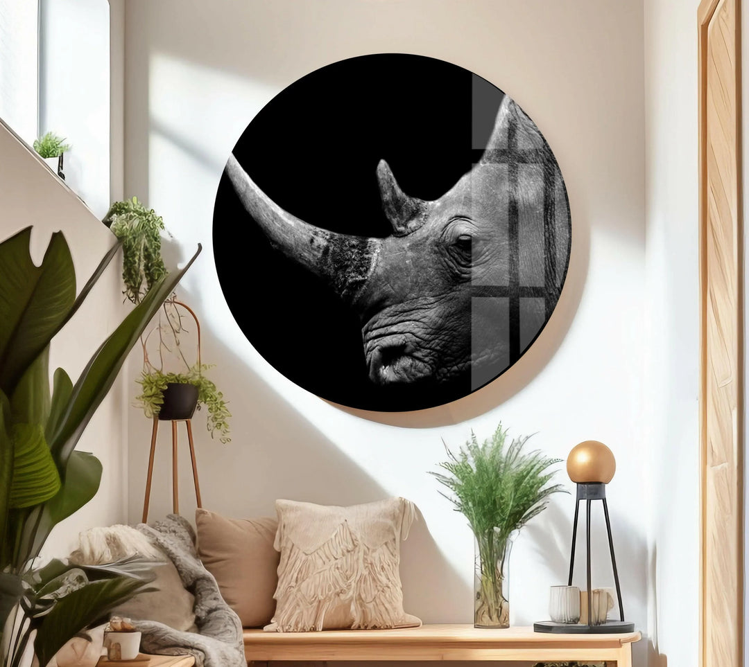 Glass panel art featuring a side-view rhinoceros head emerging from deep black.