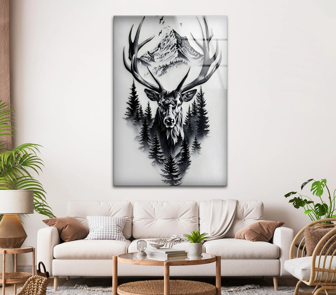 Artistic glass wall print of a deer head with large antlers set against forest and mountain views.