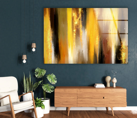 A striking glass art painting featuring bold vertical strokes of golden yellow, amber, and deep brown abstract hues.