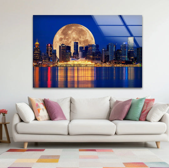 The inky night sky is the darkest element in this Vancouver skyline unique modern wall decor, contrasting with the bright supermoon and city lights reflected on the water.