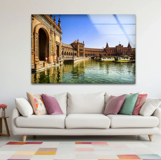 Showcasing exceptional quality, the Seville glass wall art features decorative wall art with vibrant colors and fine details of the Plaza de España's architectural beauty.