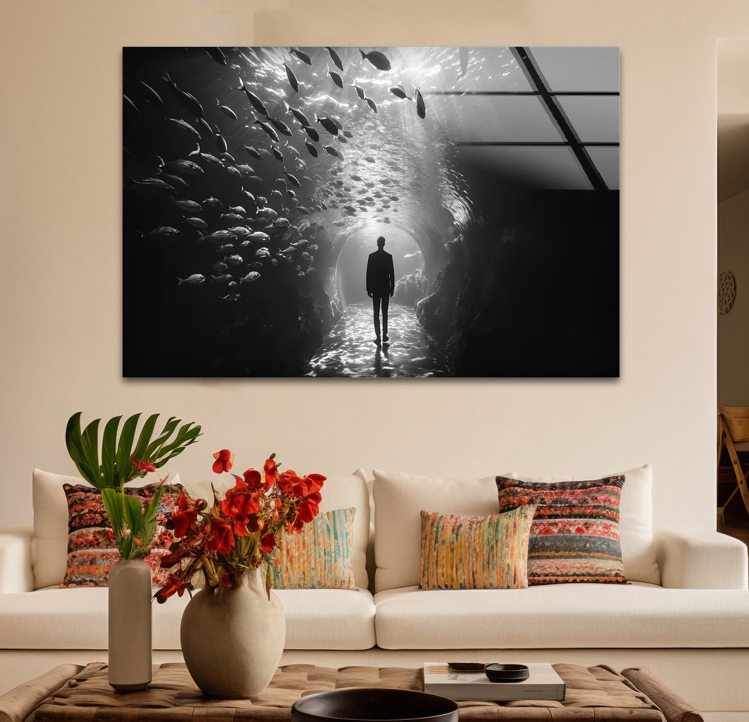 Stylish black and white paintings of a man in an aquarium, blending realism with creativity.
