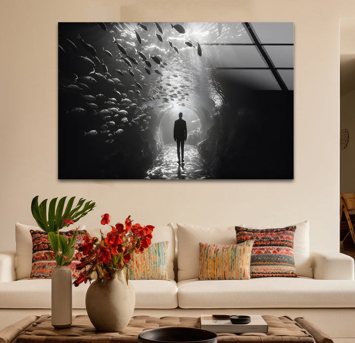 Stylish black and white paintings of a man in an aquarium, blending realism with creativity.
