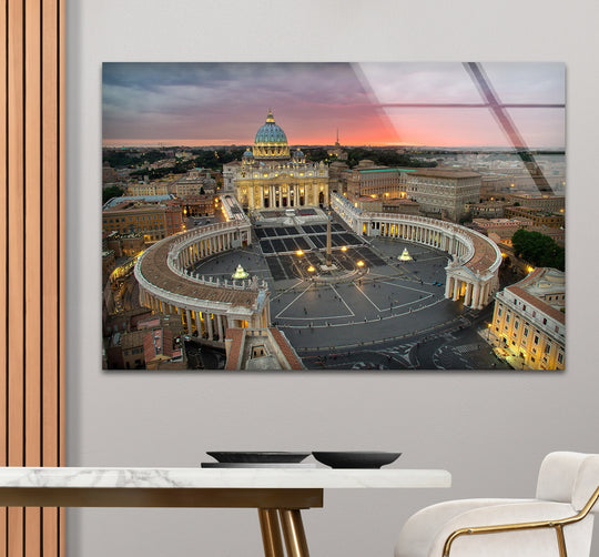 Illuminated at sunset, the background showcases the skyline behind the Vatican City glass art painting, highlighting St. Peter’s Square and its architectural grandeur.