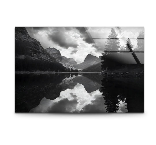 Showcasing the smooth finish, this black and white lake landscape glass wall art is perfect for adding some dramatic home decor to your space.