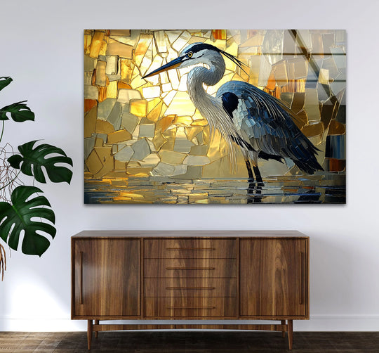 Golden Light – Heron in Mosaic Glow glass wall prints features a vibrant finish with shimmering golden light and mosaic detail.