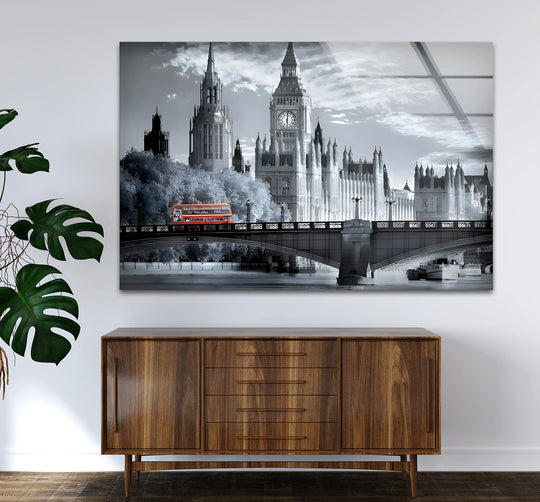 The realistic detail in the London Big Ben black and white glass wall art decor captures a bus on the bridge with precise reflections from the water.
