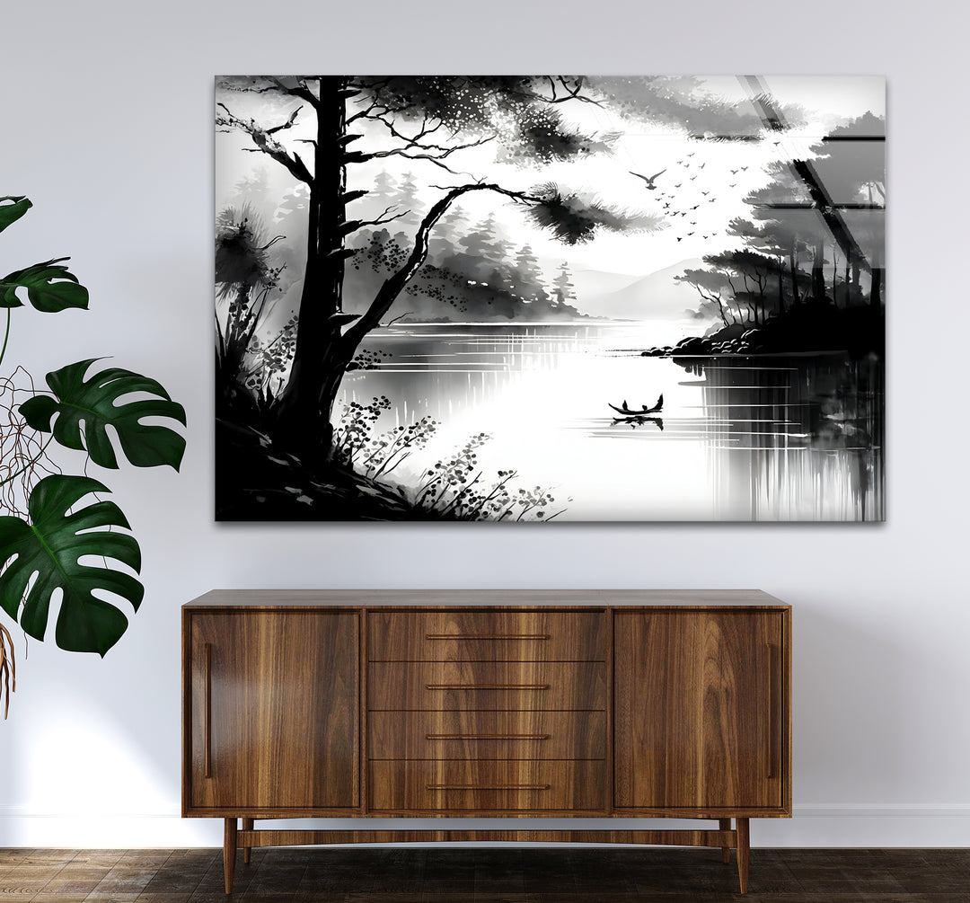 Modern black and white wall decor highlighting the peaceful charm of a lake view.