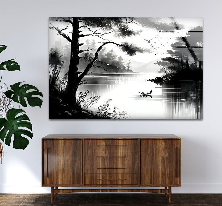 Modern black and white wall decor highlighting the peaceful charm of a lake view.