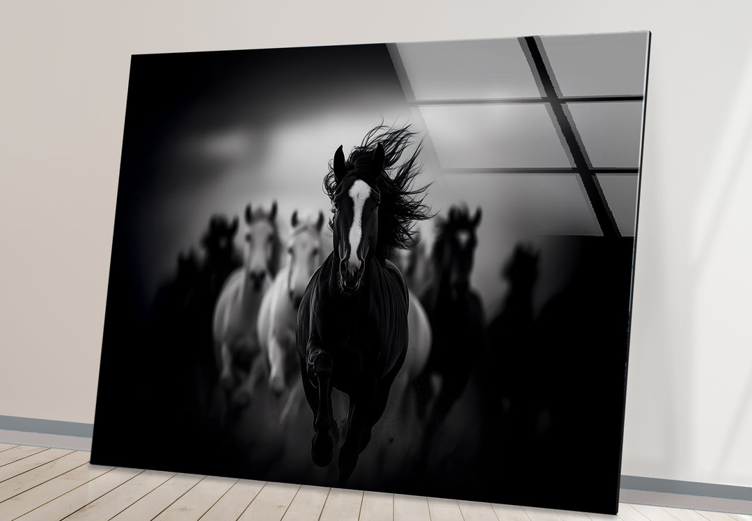 Modern black and white wall decor highlighting the energy and power of running horses.