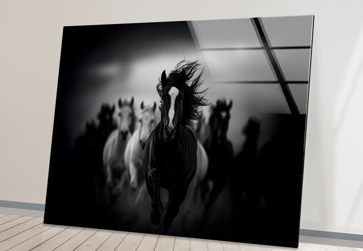 Modern black and white wall decor highlighting the energy and power of running horses.