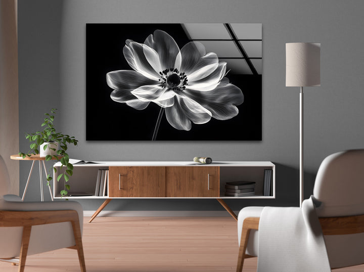 Delicate monochrome flower print on durable glass, offering modern charm for any room.

