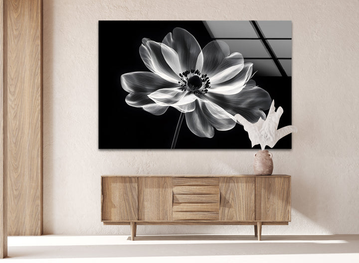 Graceful black-and-white floral design, captured on glass to enhance your living space.
