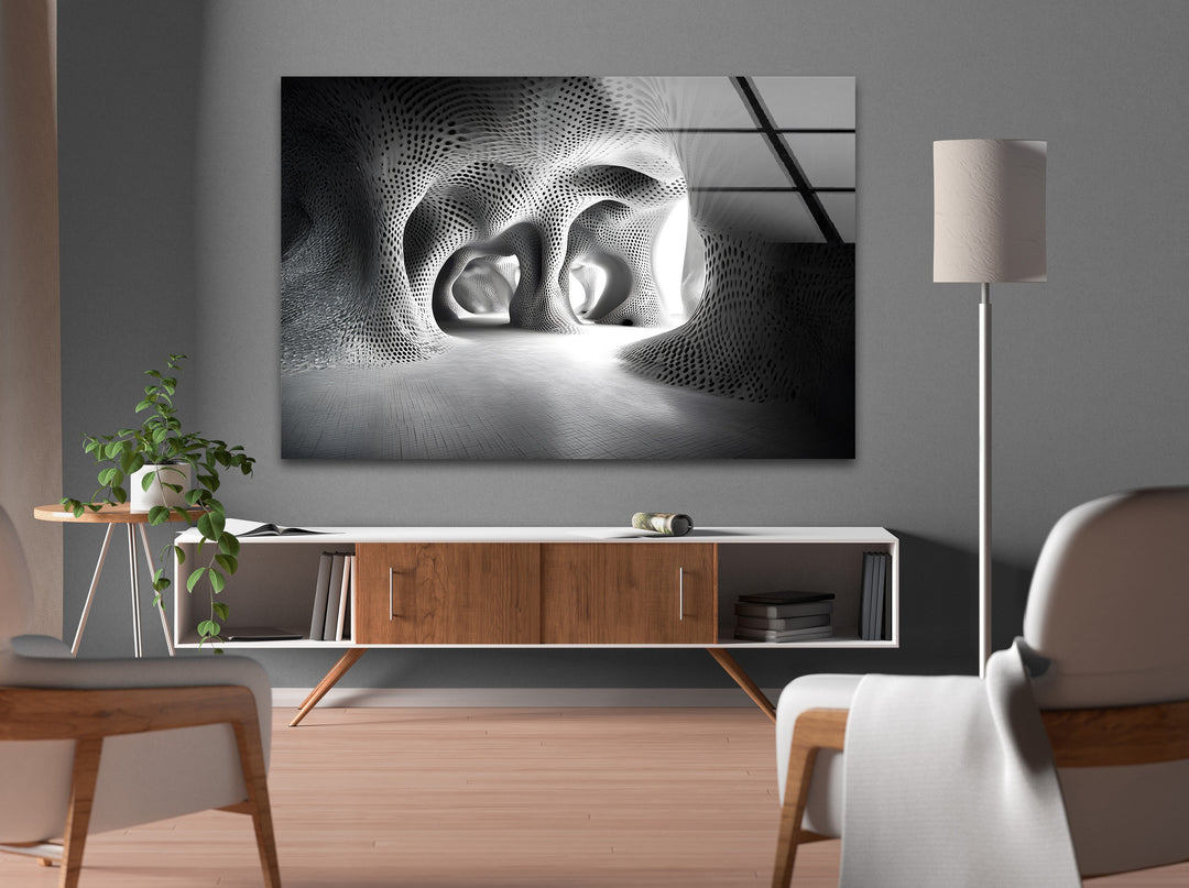 Glass wall art featuring a futuristic architectural space with organic shapes and intricate black and white detailing.
