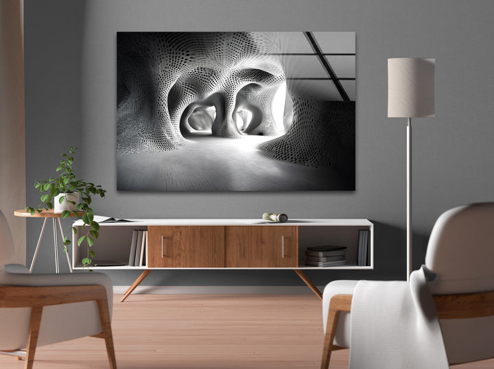 Glass wall art featuring a futuristic architectural space with organic shapes and intricate black and white detailing.
