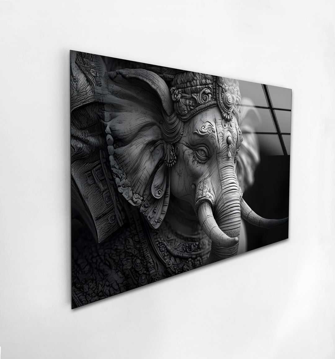 A stunning black and white glass wall art featuring an intricate depiction of Lord Ganesha.
