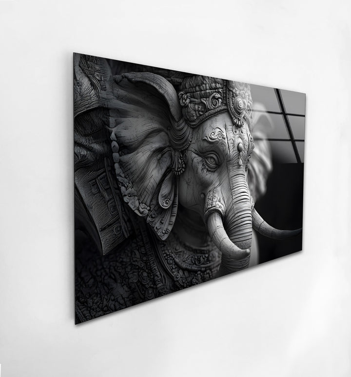 A stunning black and white glass wall art featuring an intricate depiction of Lord Ganesha.
