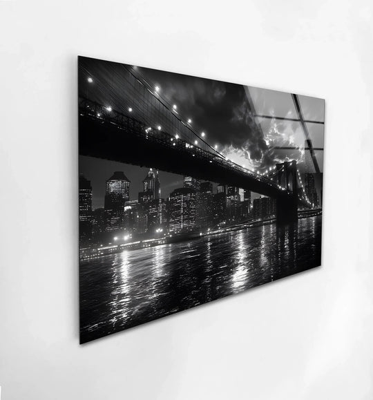 Monochromatic glass wall art showcases the Brooklyn Bridge skyline with cool color temperature, perfect for modern home decoration and adding a sleek, urban touch.