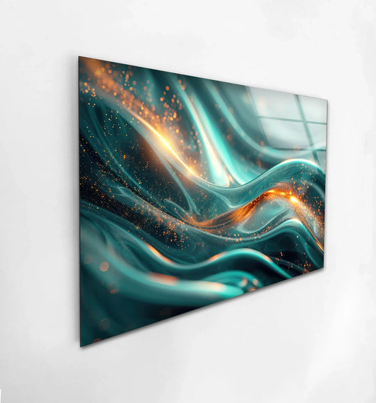 An abstract glass wall art print showcases swirling emerald waves with sparkling gold accents against a blurred background.