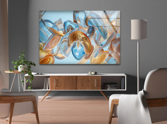 Abstract glass wall art with warm brown and cool blue hues creates a balanced color temperature.