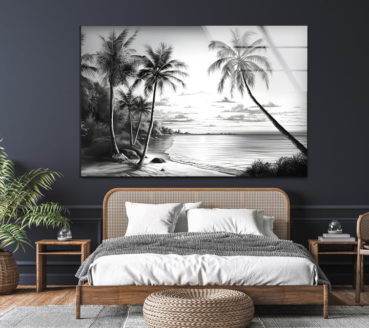 Tropical palm trees and a calm ocean captured in timeless black and white glass wall art.