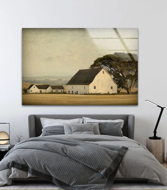 Abstract quality is highlighted through the blending tones and textures in this vintage countryside barn scene captured in rustic farmstead charm glass wall art decor.