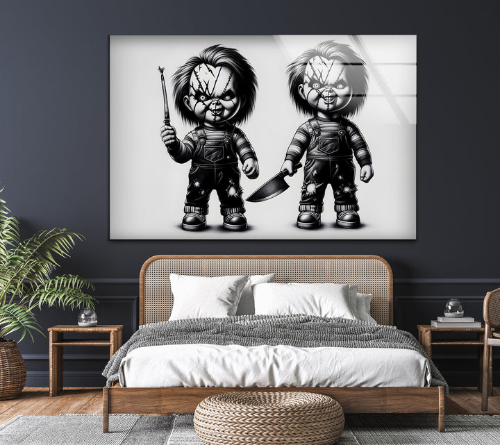 A striking black and white artwork depicting two sinister dolls ready to unleash terror.

