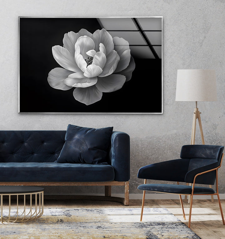 A breathtaking black and white glass wall art piece showcasing the intricate details of a delicate bloom.