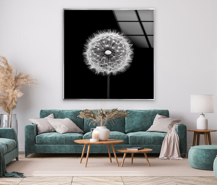 Nature-inspired glass wall art highlighting the delicate form of a dandelion in stunning black and white.