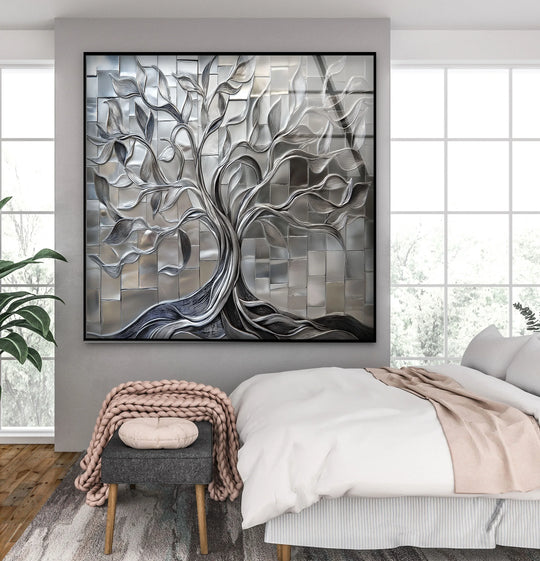 Illuminated, the brightest area highlights the modern, geometric tile design in this radiant silver tree print wall art, a stunning piece of glass wall art.