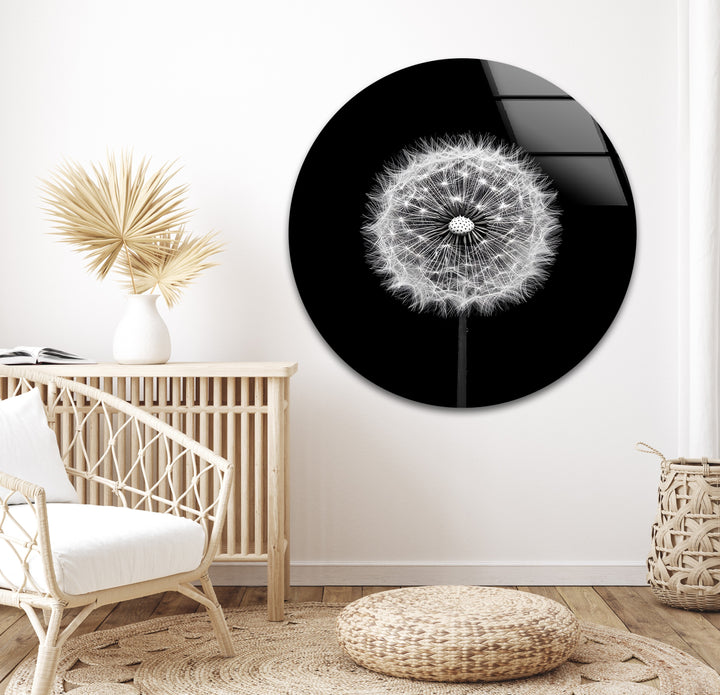 A sophisticated floral composition, capturing the fragile beauty of a dandelion in black and white glass wall art.