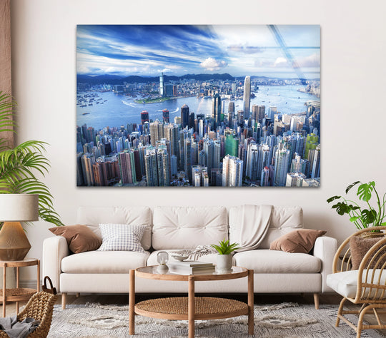 Soft, cloud-like patterns in the Hong Kong skyline adorn this best glass art of an aerial cityscape and harbor view, bringing a sense of calm to the vibrant scene.