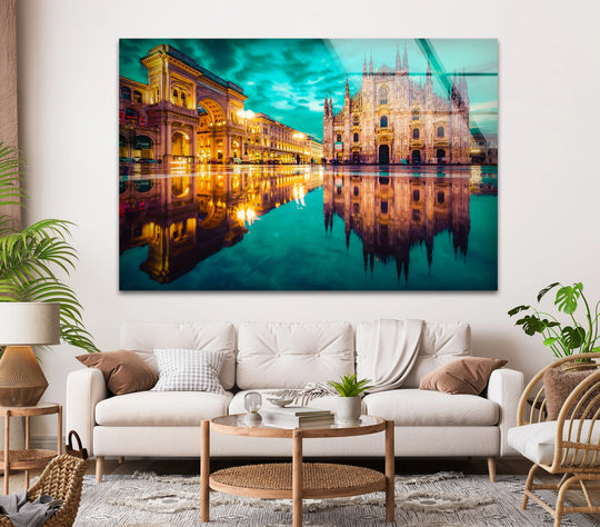 Vibrant golden lights create a stunning color contrast with the cool teal sky, reflecting in the water and defining this Milan Cathedral decorative wall art.